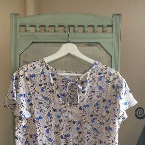 Floral Gap tie-neck top.